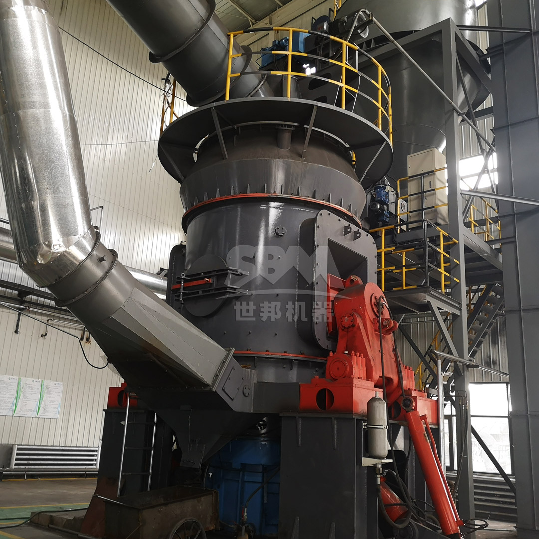 Technician performing maintenance on coal grinding mill components