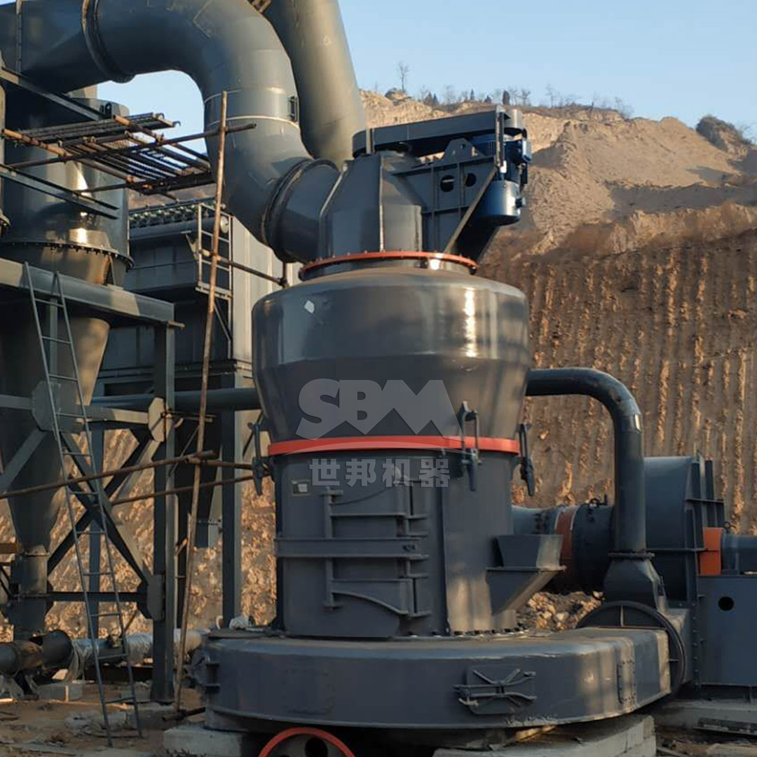 Raw attapulgite ore being fed into a crushing machine at a mineral processing plant