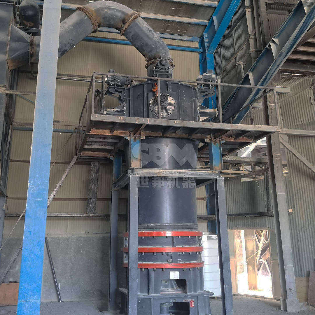 SCM Series Ultrafine Mill in operation at an illite powder production facility showing its compact design and dust collection system