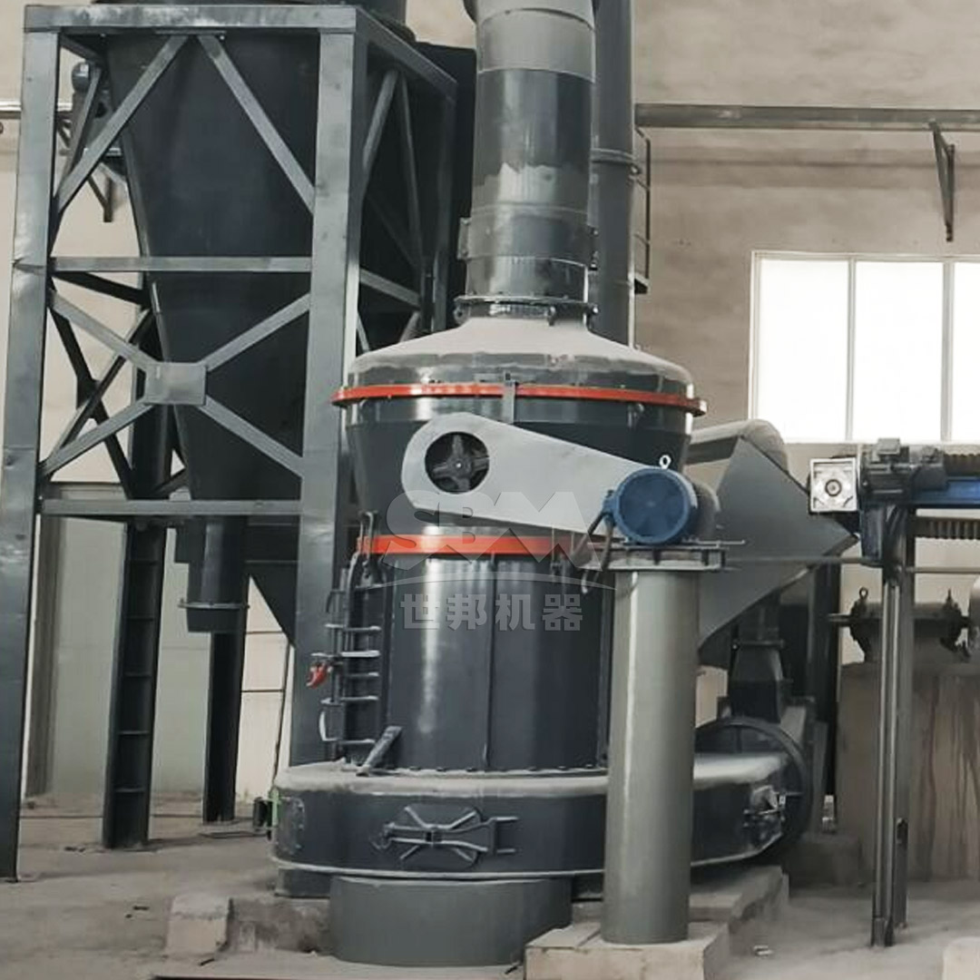 Gypsum crushing plant with primary jaw crusher and hammer mill in operation, showing material flow from hopper to conveyor system