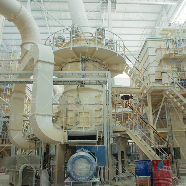 Large vertical roller mill used for high-capacity barite grinding in industrial processing plant