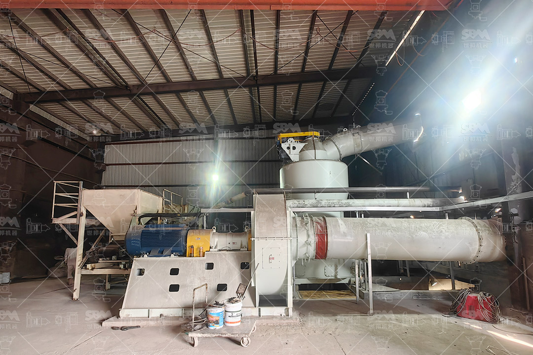 Raw attapulgite ore being fed into a grinding mill